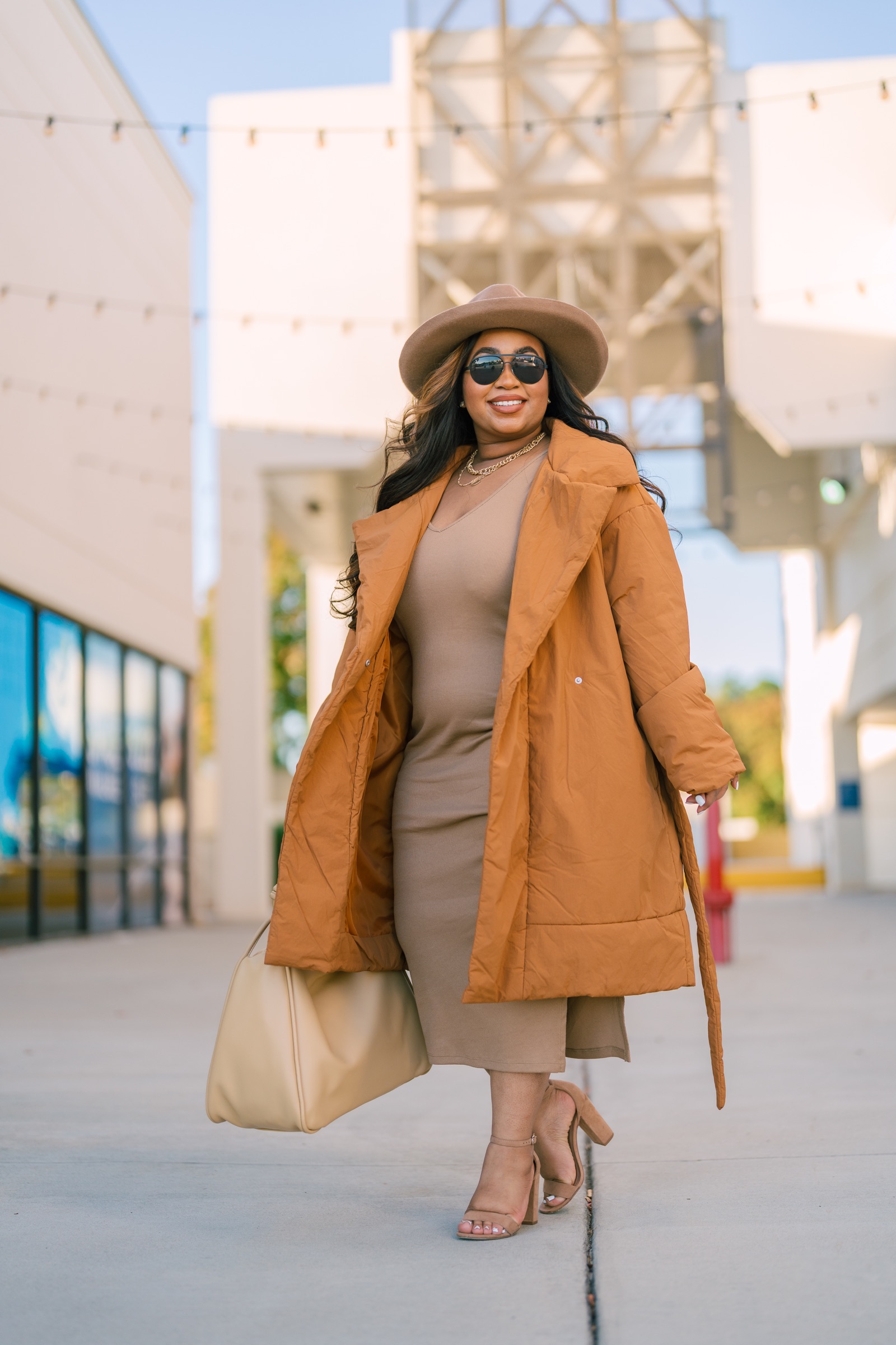 Professional walking through an outdoor shopping district for a lifestyle portrait