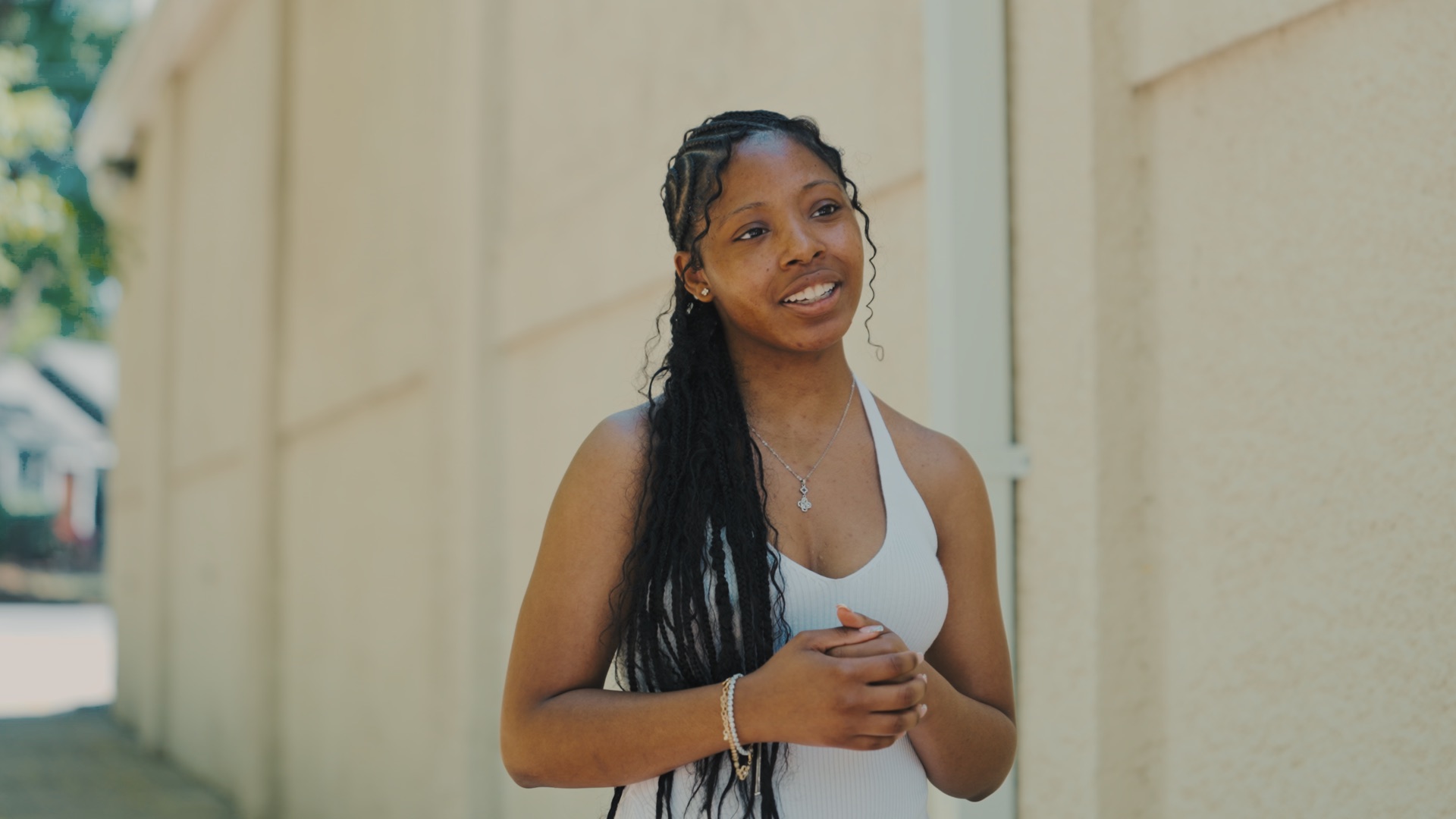 Client sharing her story during an outdoor interview