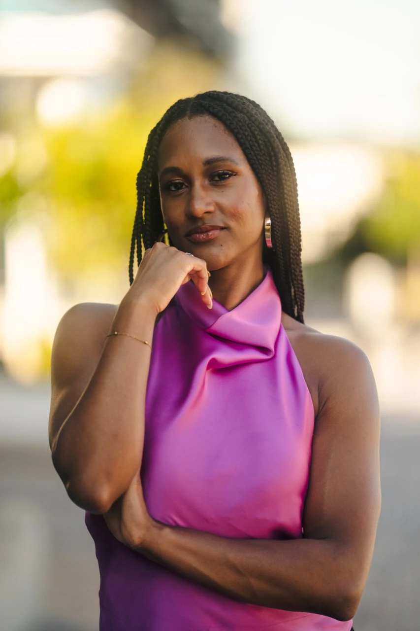 Jasmine Neely in a pink satin top for a close personal brand portrait