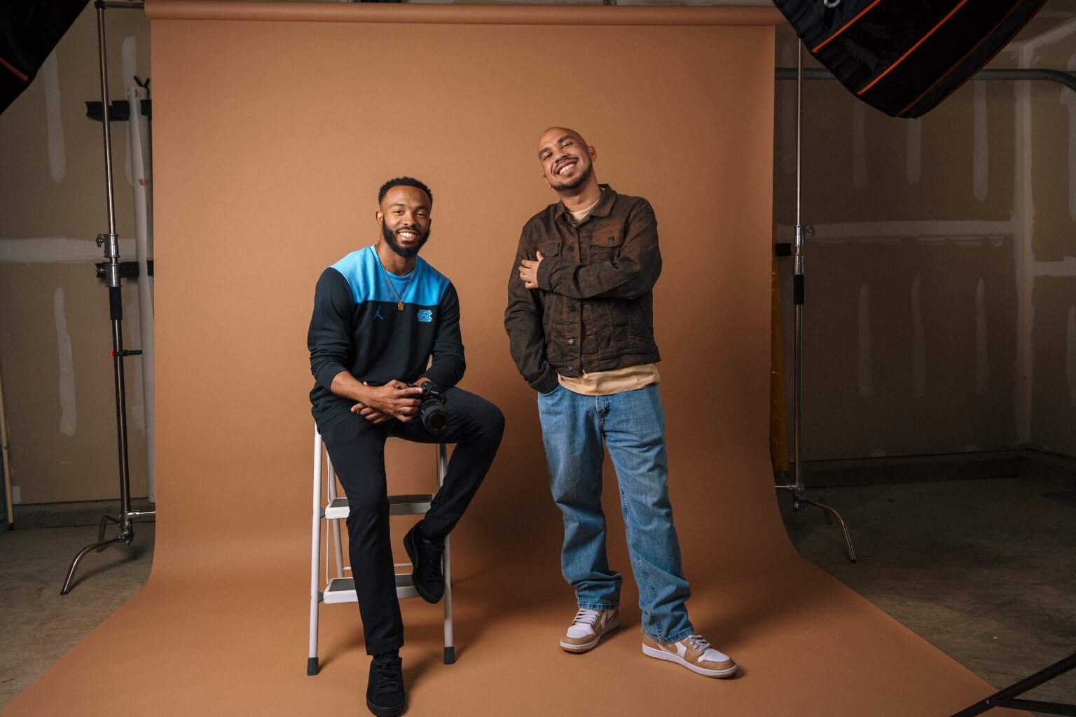 Motion Visual Media photographer and portrait client together in the studio